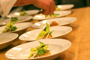 Plating the antipasto.