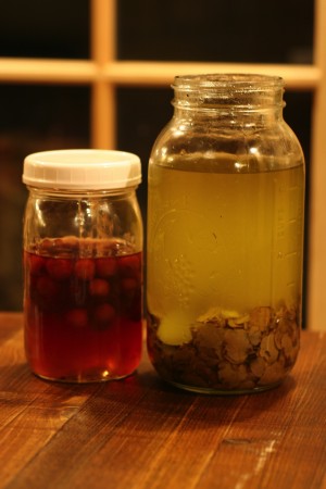 The chefs jar and can as much as they can forage, including these sour cherries and homemade truffle oil.