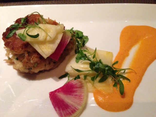 The crab cake at the Four Season's in Denver's Edge Restaurant is a great way to start the meal.