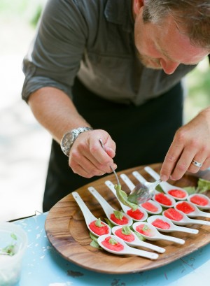 Spur's Kevin Humprheys preparing the watermelon for the guests. 
