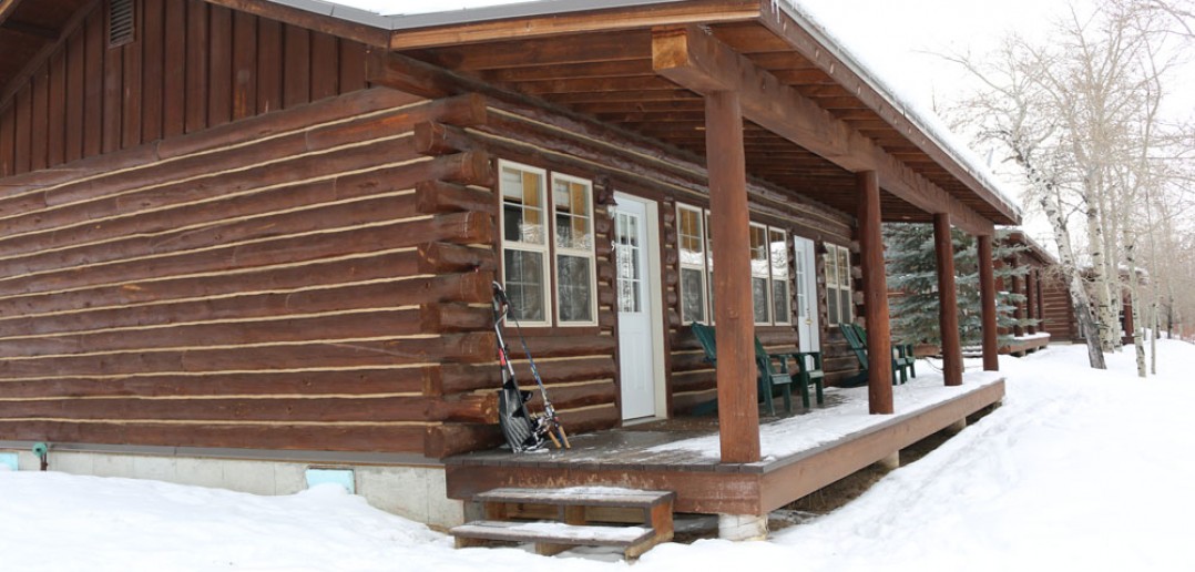 The cabins at Lakeside Lodge in Pinedale have sweeping views of the now frozen Freemont lake.