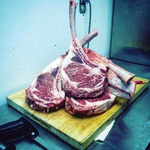 Sizing up the meat pre-grill at Million Dollar Cowboy Steakhouse