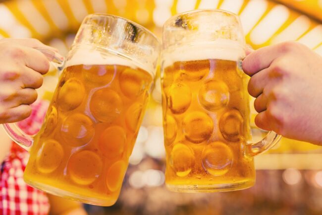 Beer Stein cheers Snowking Oktoberfest